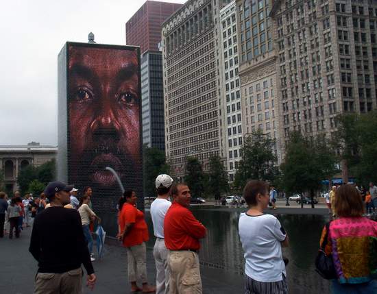 Yes, that is a huge face spitting out water!