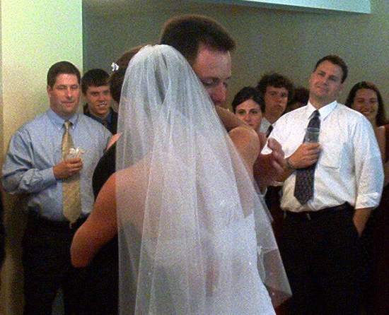 That guy on the right looks very moved by the moment!