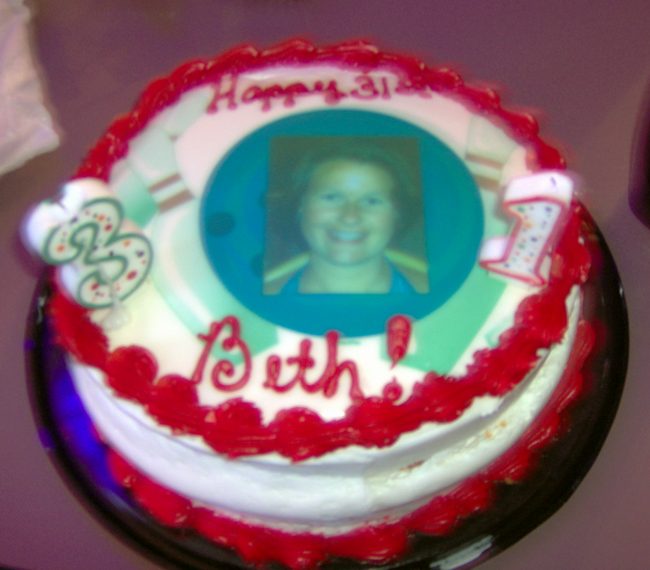 Your eyes are not deceiving you!  That's Beth immortalized in cake!