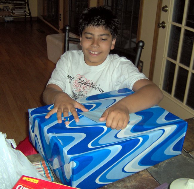 Ben looks excited for his gift!