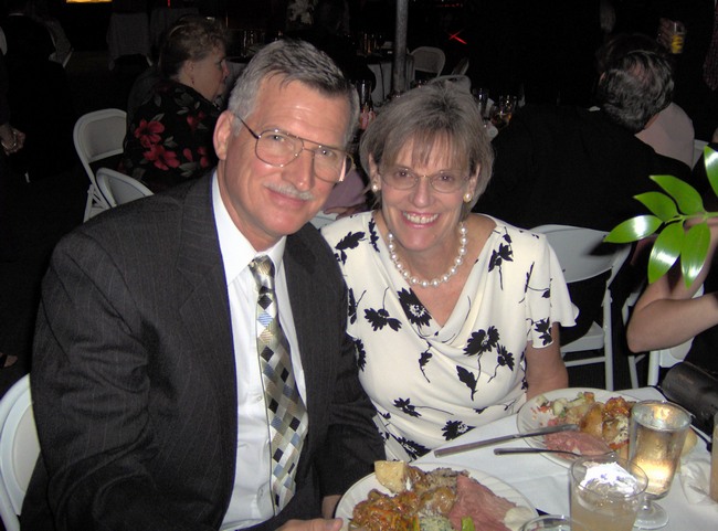 Mom and Dad trying to enjoy their dinner!