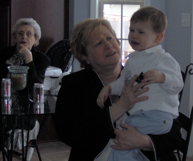 Connor and Grandma!  Great Grandma is wondering if Connor will turn the hose on her, just like his dad!