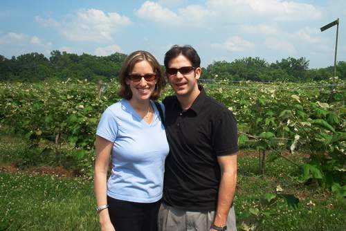 Jen and Brock by the vines.