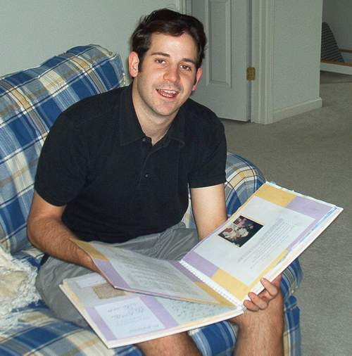 Brock enjoying a scrapbook.  What a sensitive guy!