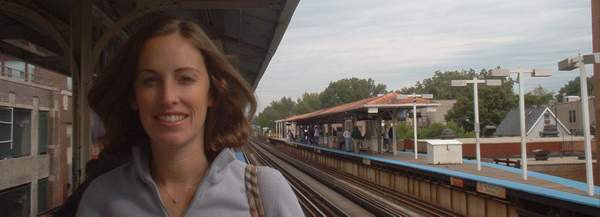 Jen waiting on the train.